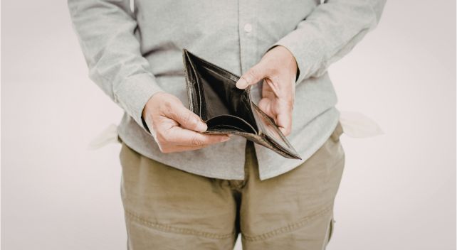 außergerichtlicher Vergleich oder Insolvenzantrag, Symbolbild: leerer Geldbeutel
